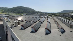 photovoltaic panel fixing systems for roof mounting with shed Tolio 25 tannery construction site